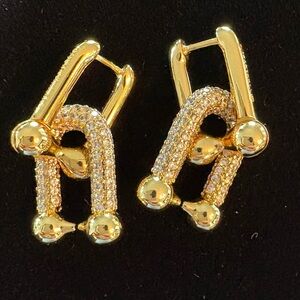 Beautiful abstract design earrings; 18k plated w/ pave stones.